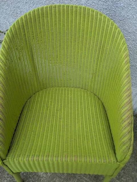 Lime green wicker armchair