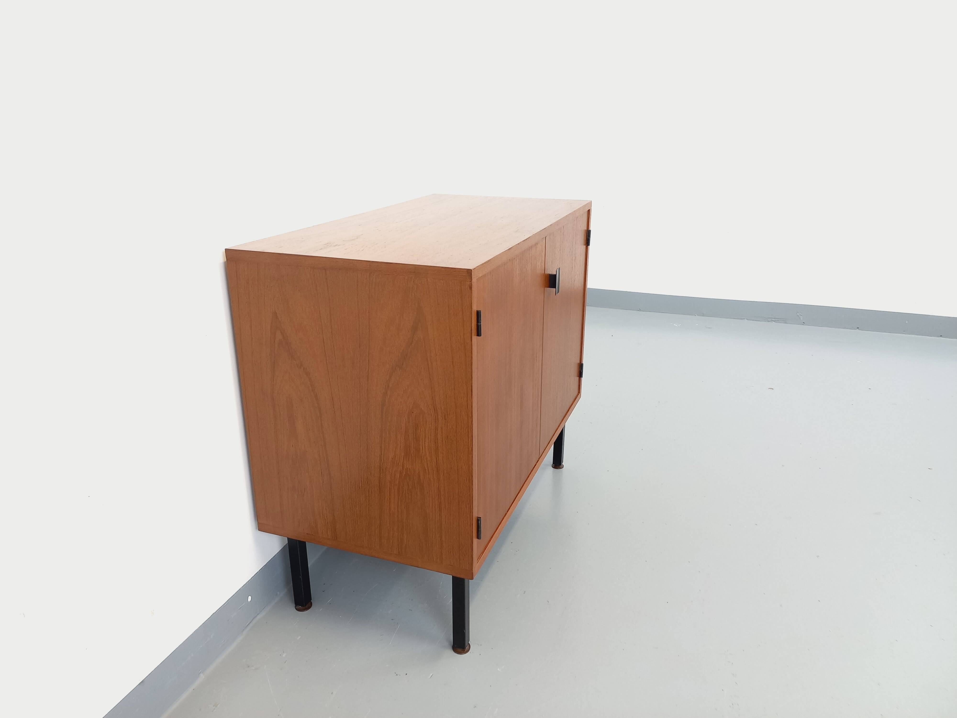 Small vintage storage unit in modernist Scandinavian style in teak from the 60s