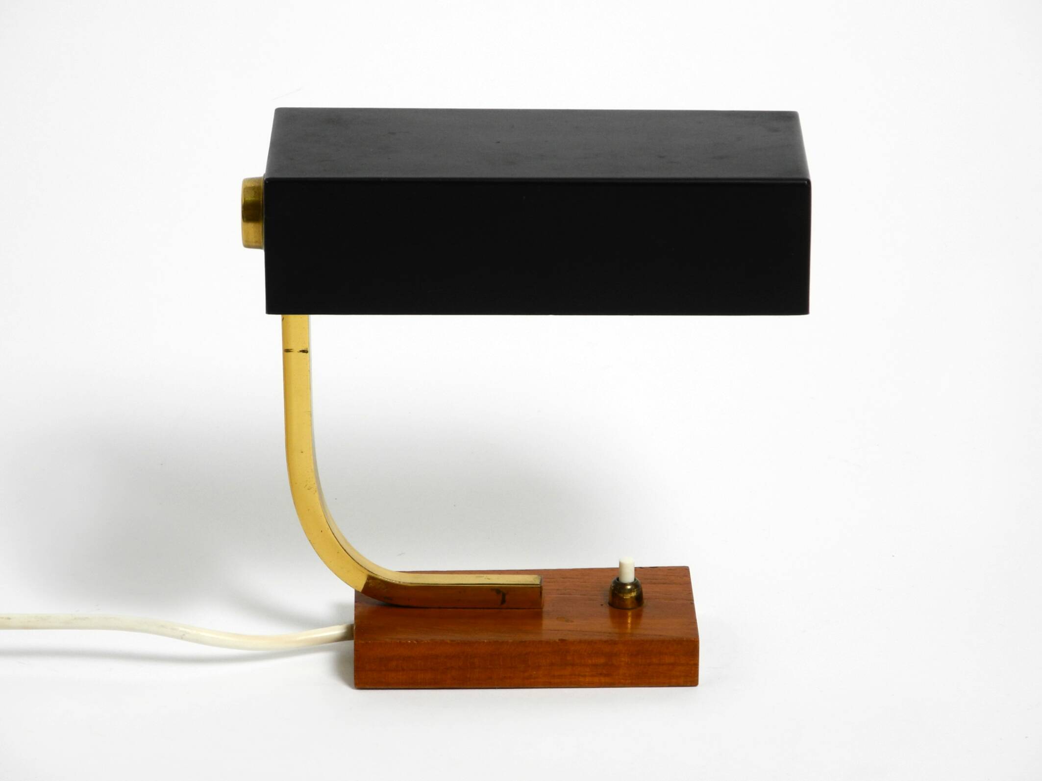 Beautiful small Mid Century Modern metal and brass table lamp with teak bas