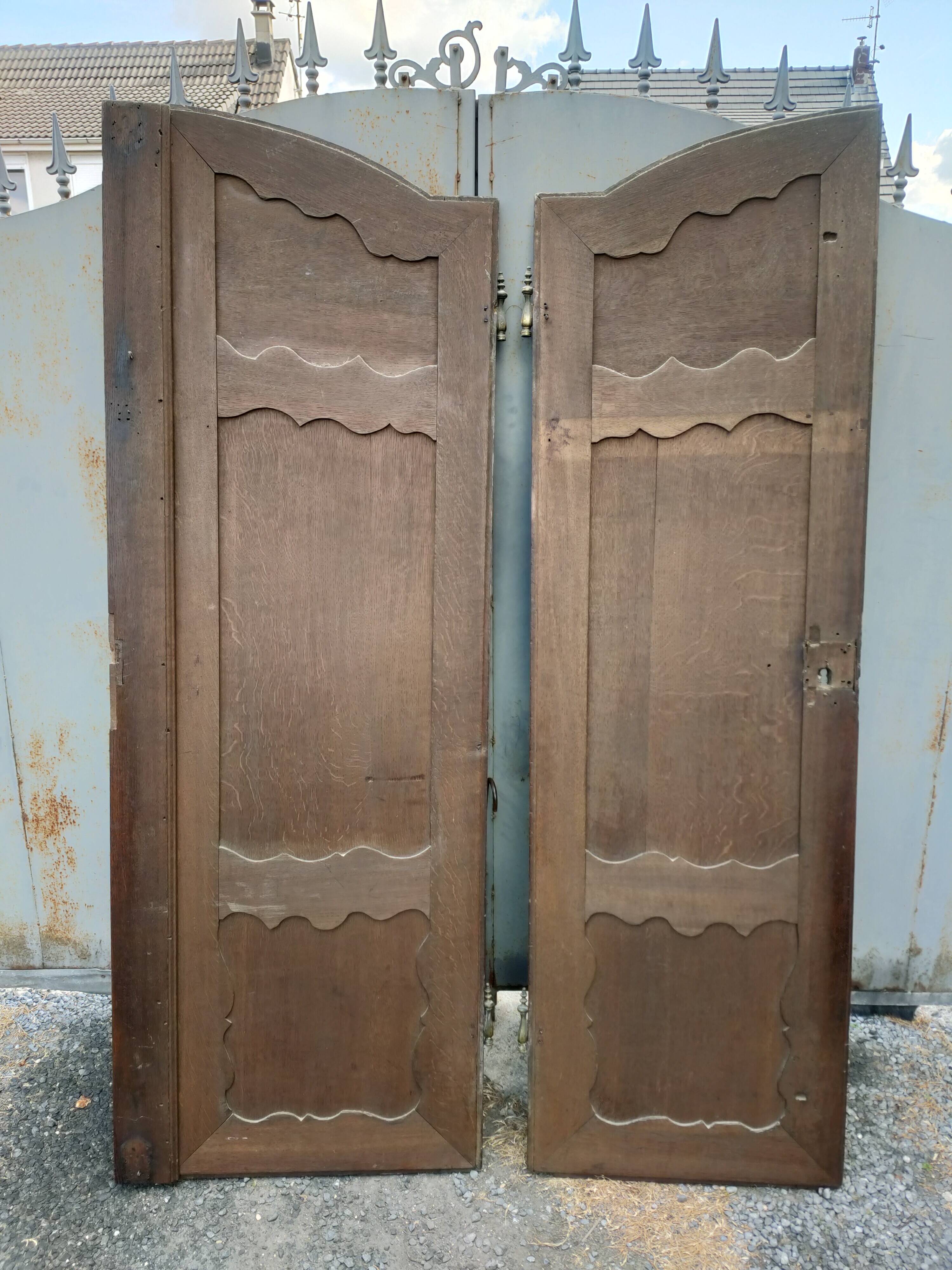 Pair of antique oak wardrobe doors