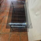 Smoked glass and brass coffee table from the 1970s.