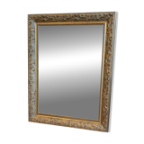 Gilded mirror with antique wood and stucco frame
