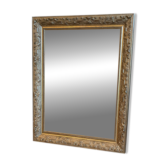 Gilded mirror with antique wood and stucco frame