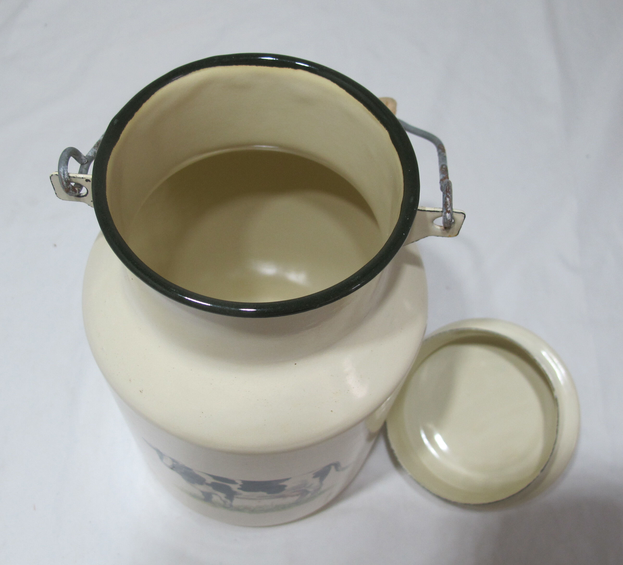 Milk jug in vintage enamelled sheet metal