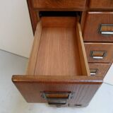 Antique oak apothecary cabinet with drawers