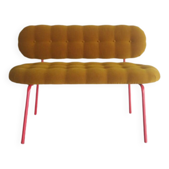 Upholstered bench with tufting