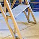 Old small painter's stepladder, wooden trade furniture, step stool