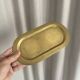 Empty pocket ensemble and bowl in solid brass signed Giò Lanciani.