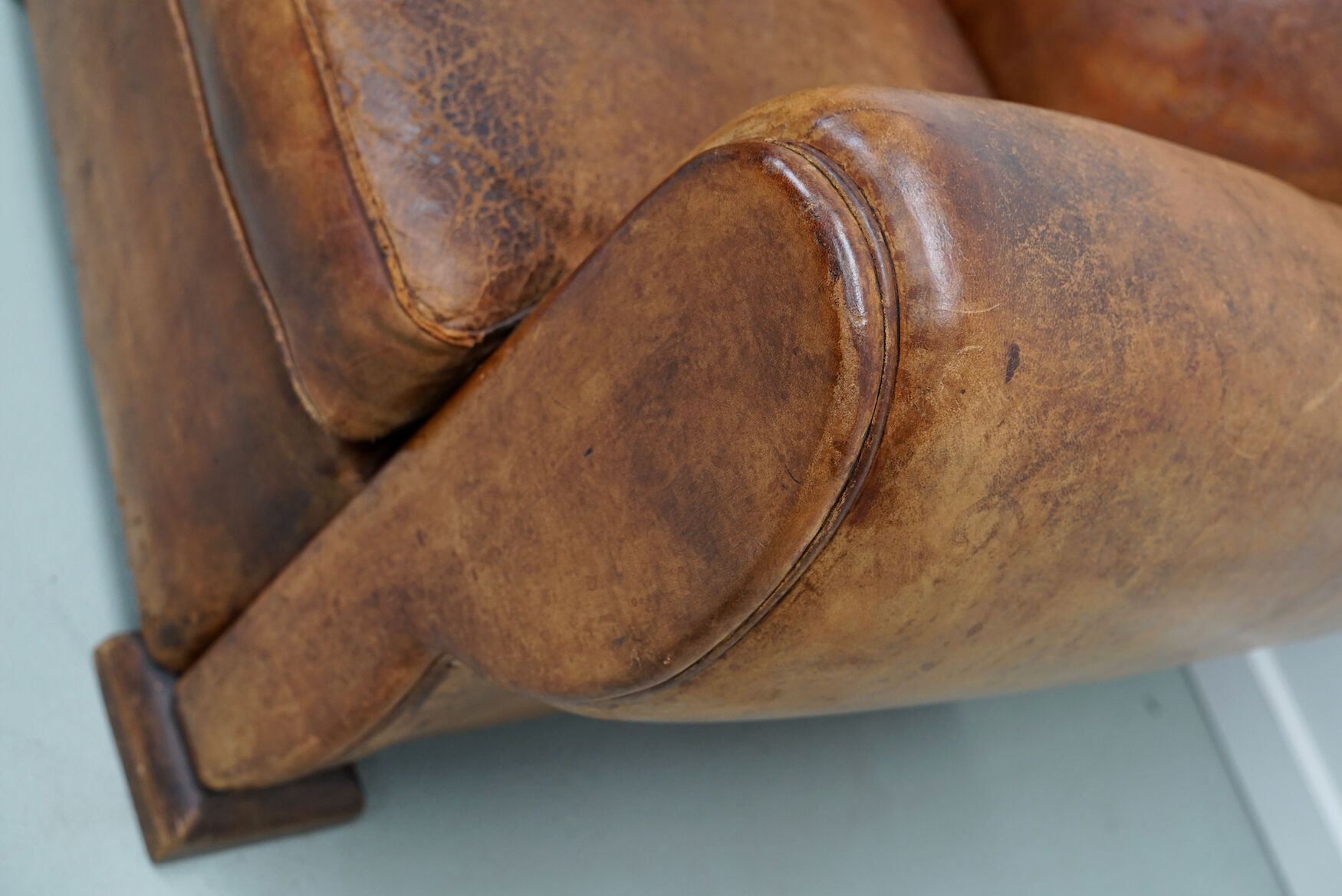 French moustache back cognac-colored leather club chair, 1940s
