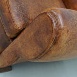 French moustache back cognac-colored leather club chair, 1940s