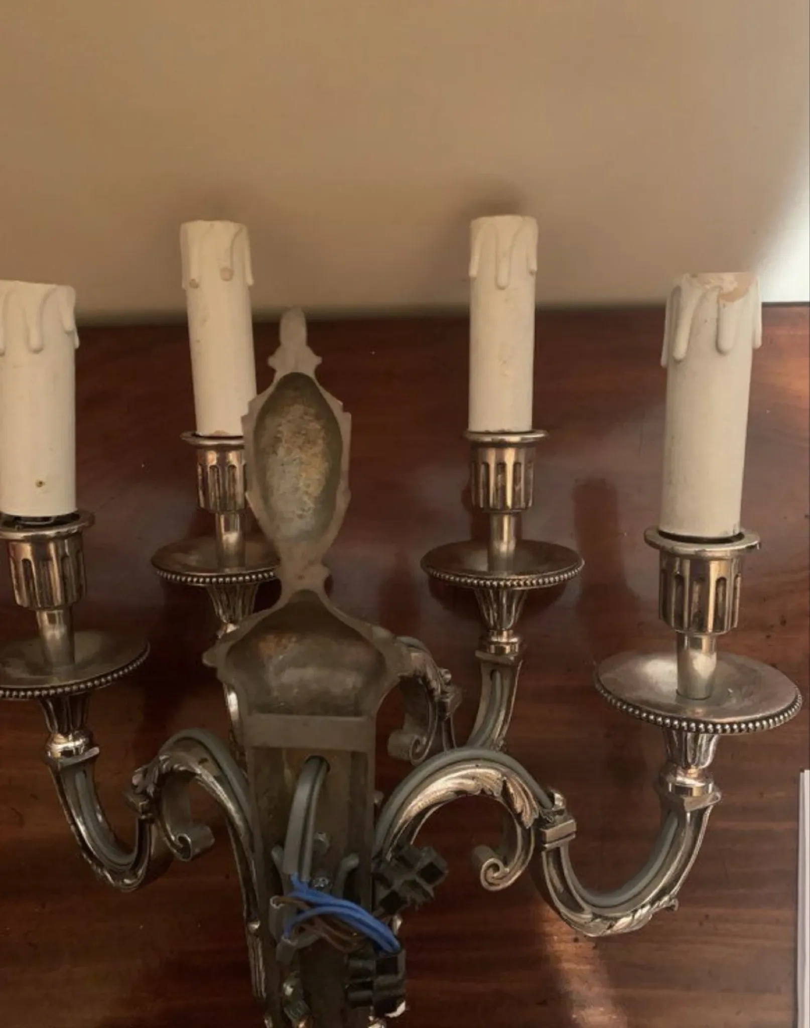 Bronze and silver wall sconce