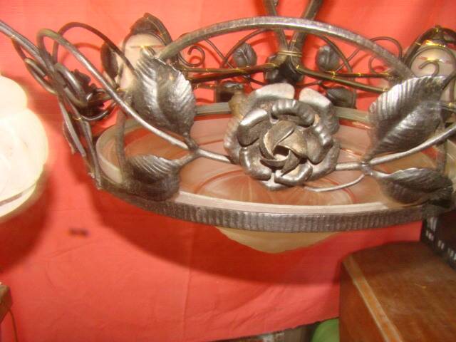 four-armed wrought iron chandelier from the "Art Deco" period (1925)