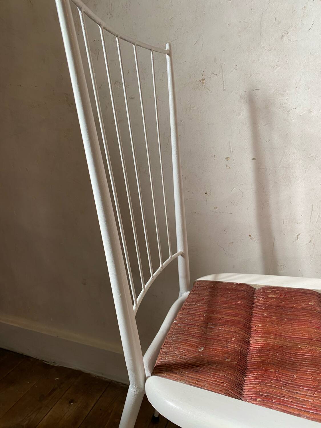 Metal and straw chairs