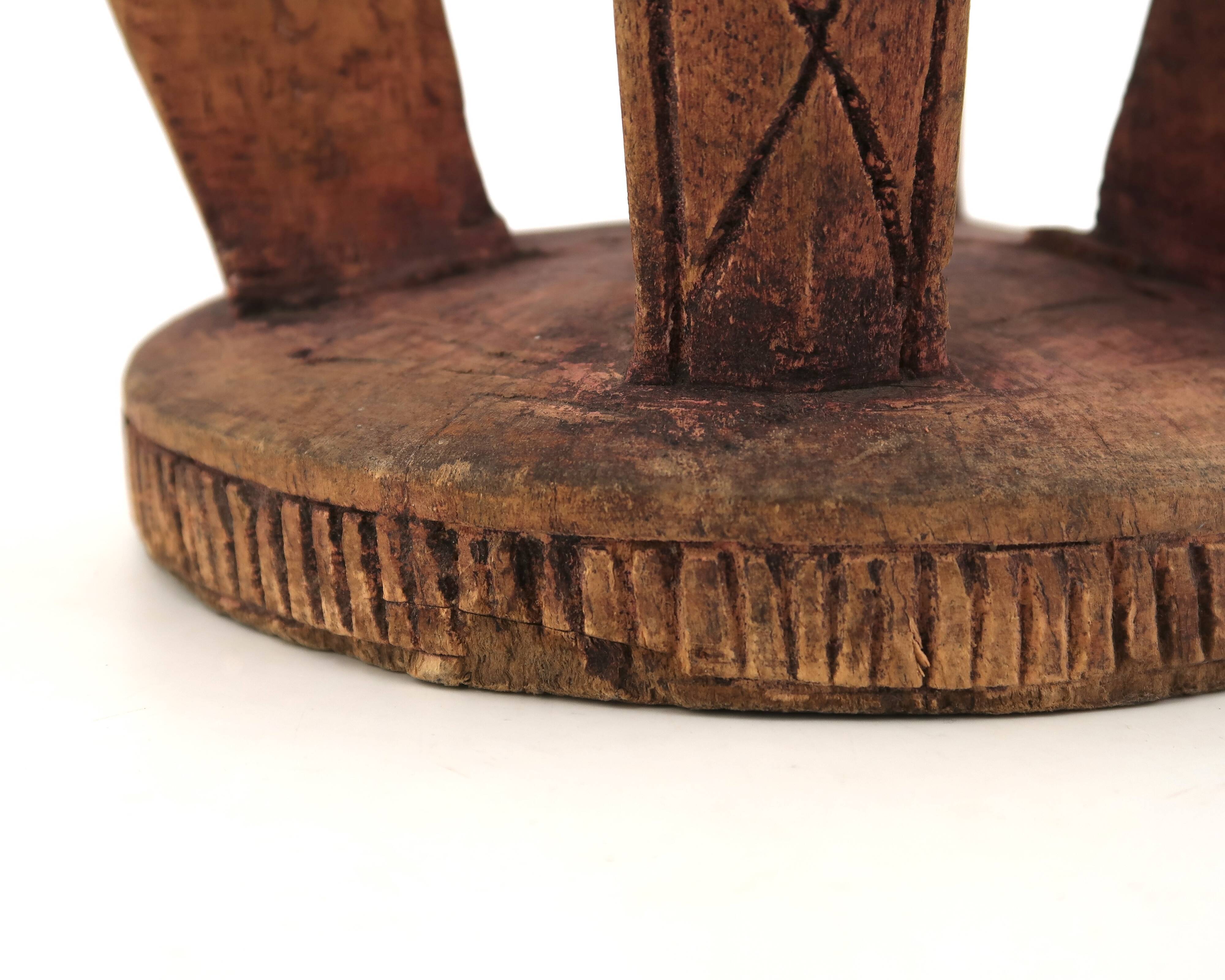 African stool with scarified wooden decoration, 1980s