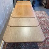 Oak dining table with integrated extensions