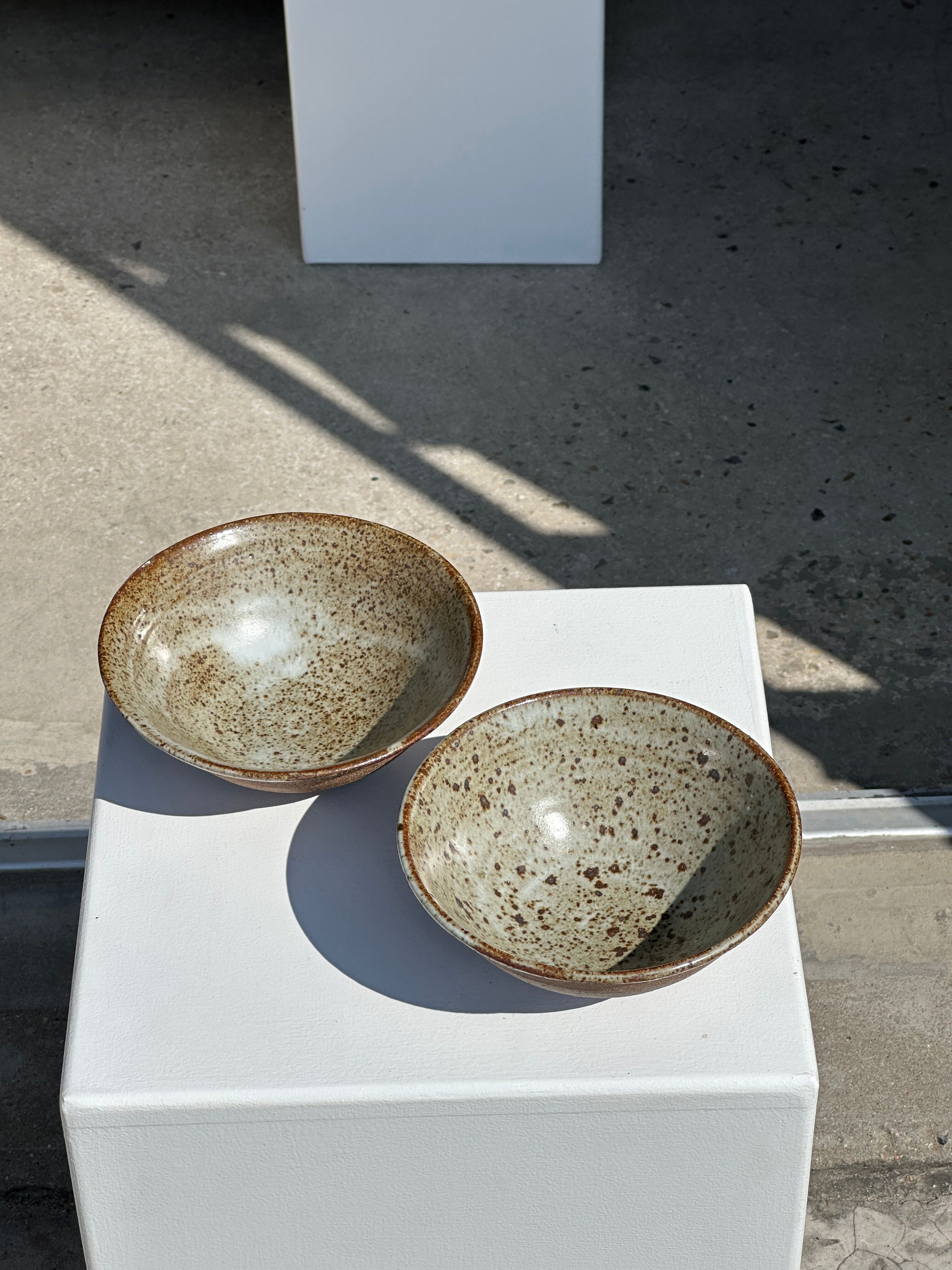 Duo of ceramic bowls interior glazed exterior matt raw earth