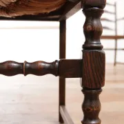 Pair of English oak armchairs with ladder back and rush seats