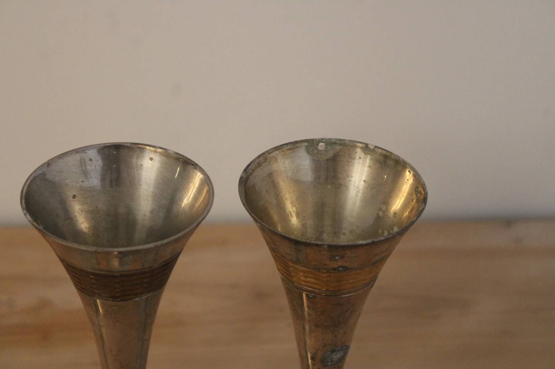 Set of 3 vintage silver-plated and gold footed cups.