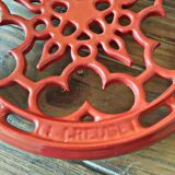 Red cast iron underside Le Creuset