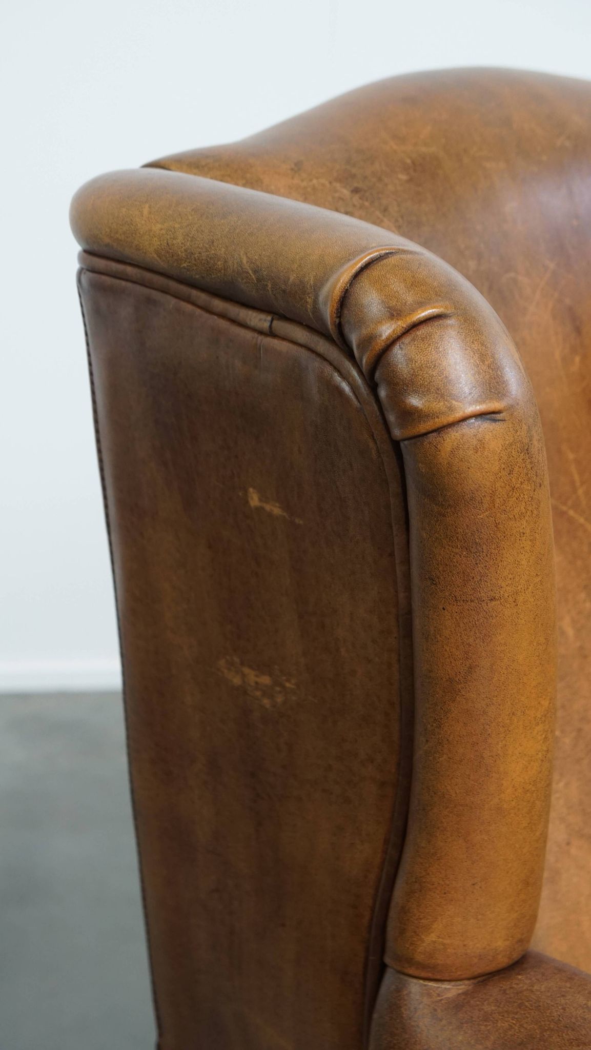Fauteuil à oreilles vintage en cuir de mouton