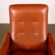 Vintage armchair from the 1970s in foam, faux leather, and metal.