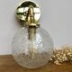 Vintage glass globe wall sconce