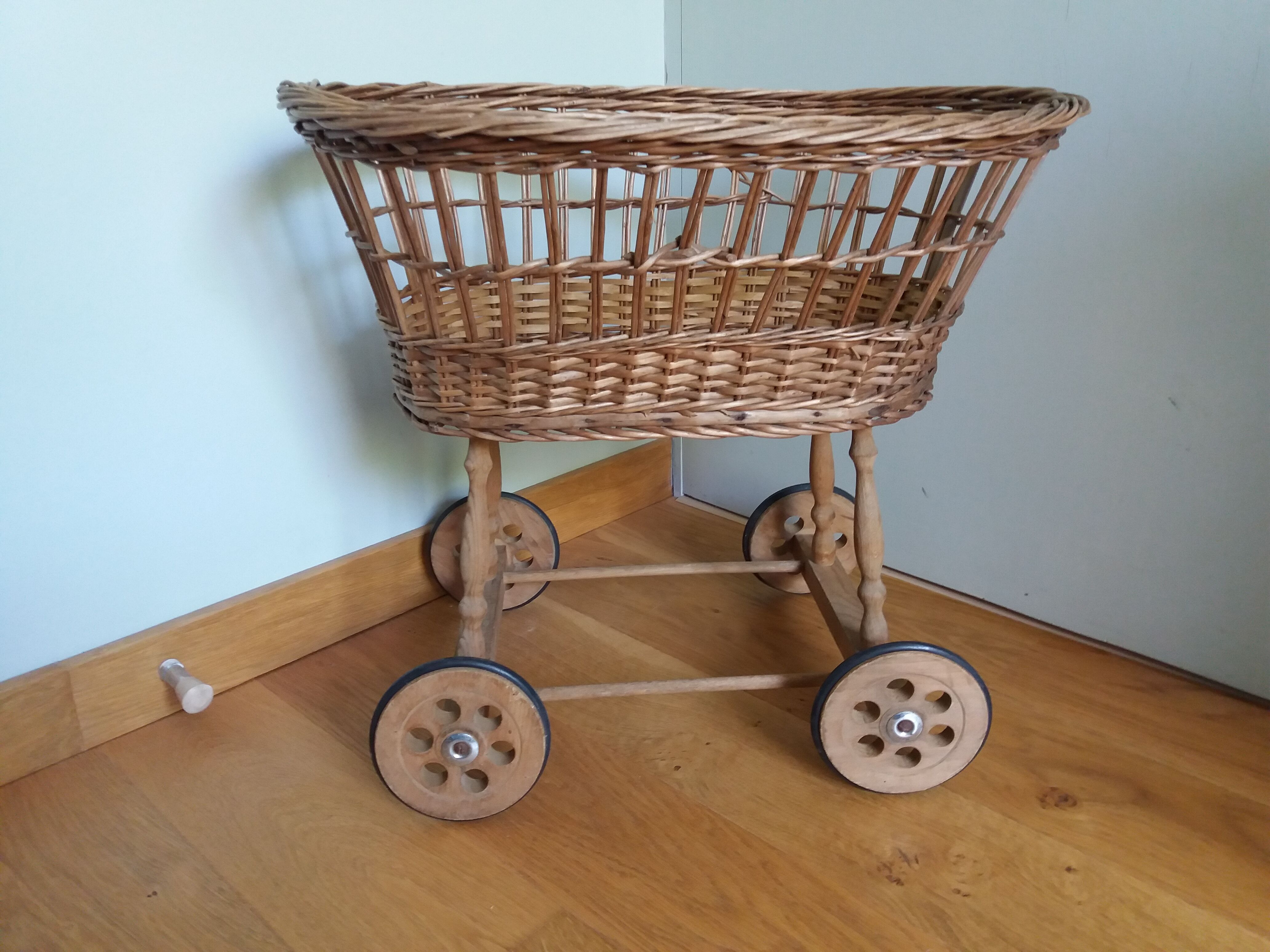 Wicker rattan doll cradle with wheels