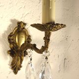 Pair of wall clams in gilded bronze stamps