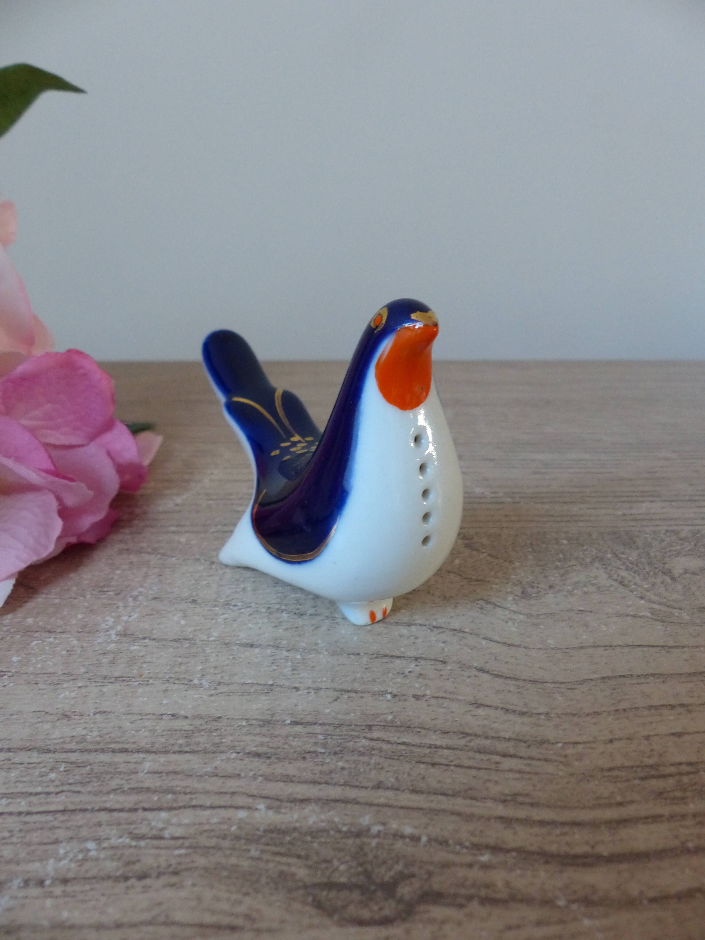 Vintage Soviet salt and pepper shaker in the shape of a cobalt blue bird.