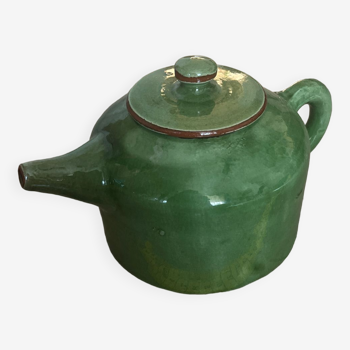 Green ceramic teapot