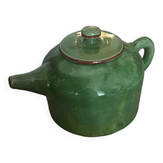 Green ceramic teapot