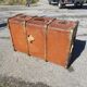 Old travel trunk made of wood and brass