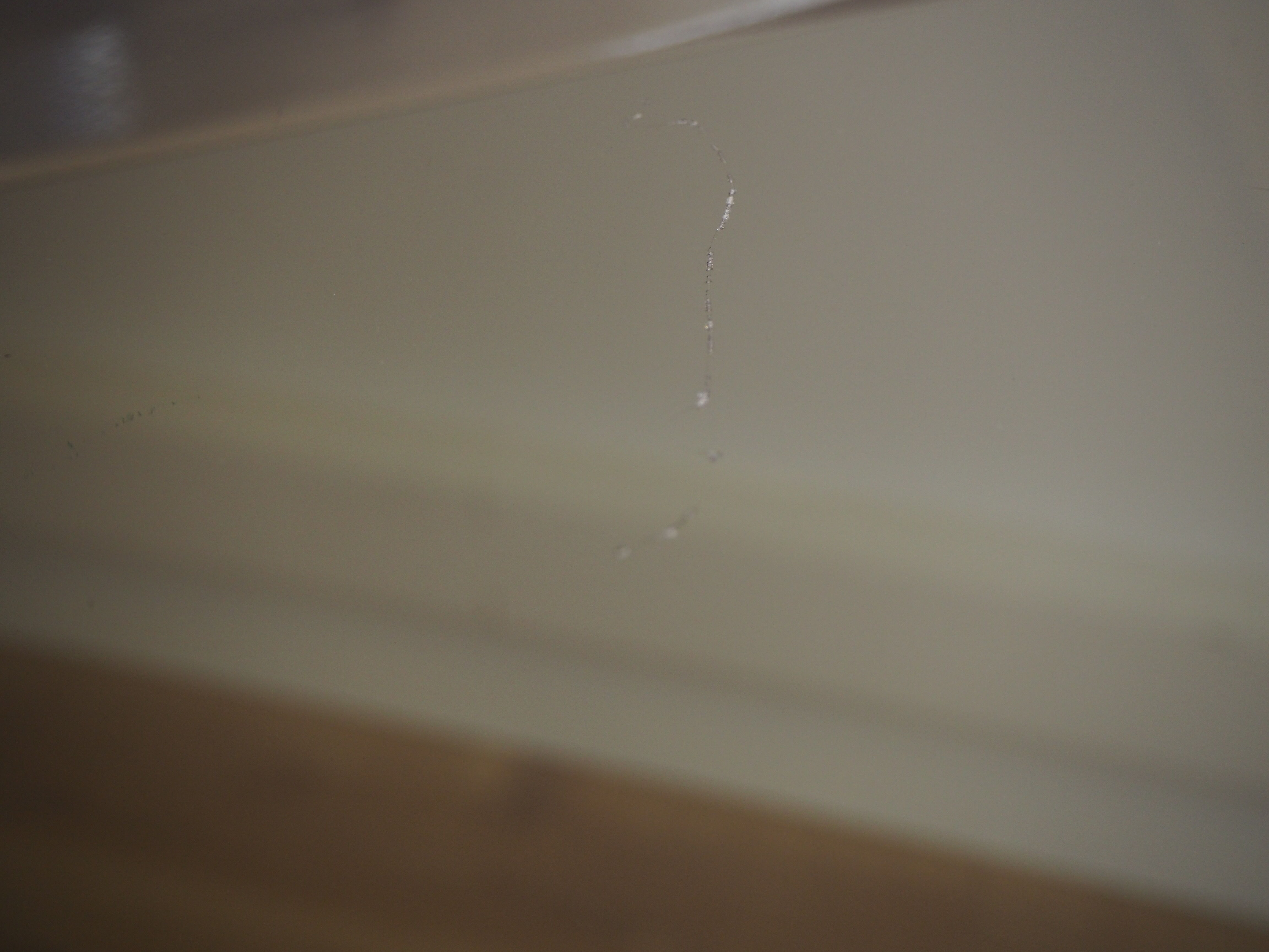 Smoked glass round dining table