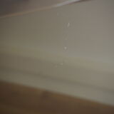 Smoked glass round dining table