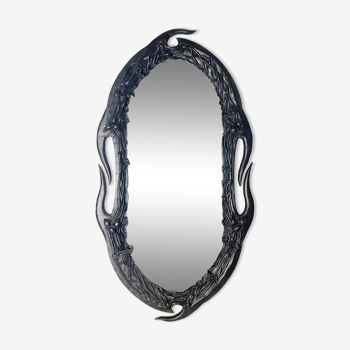 Midcentury wavy "Art Nouveau" leather wrapped mirror