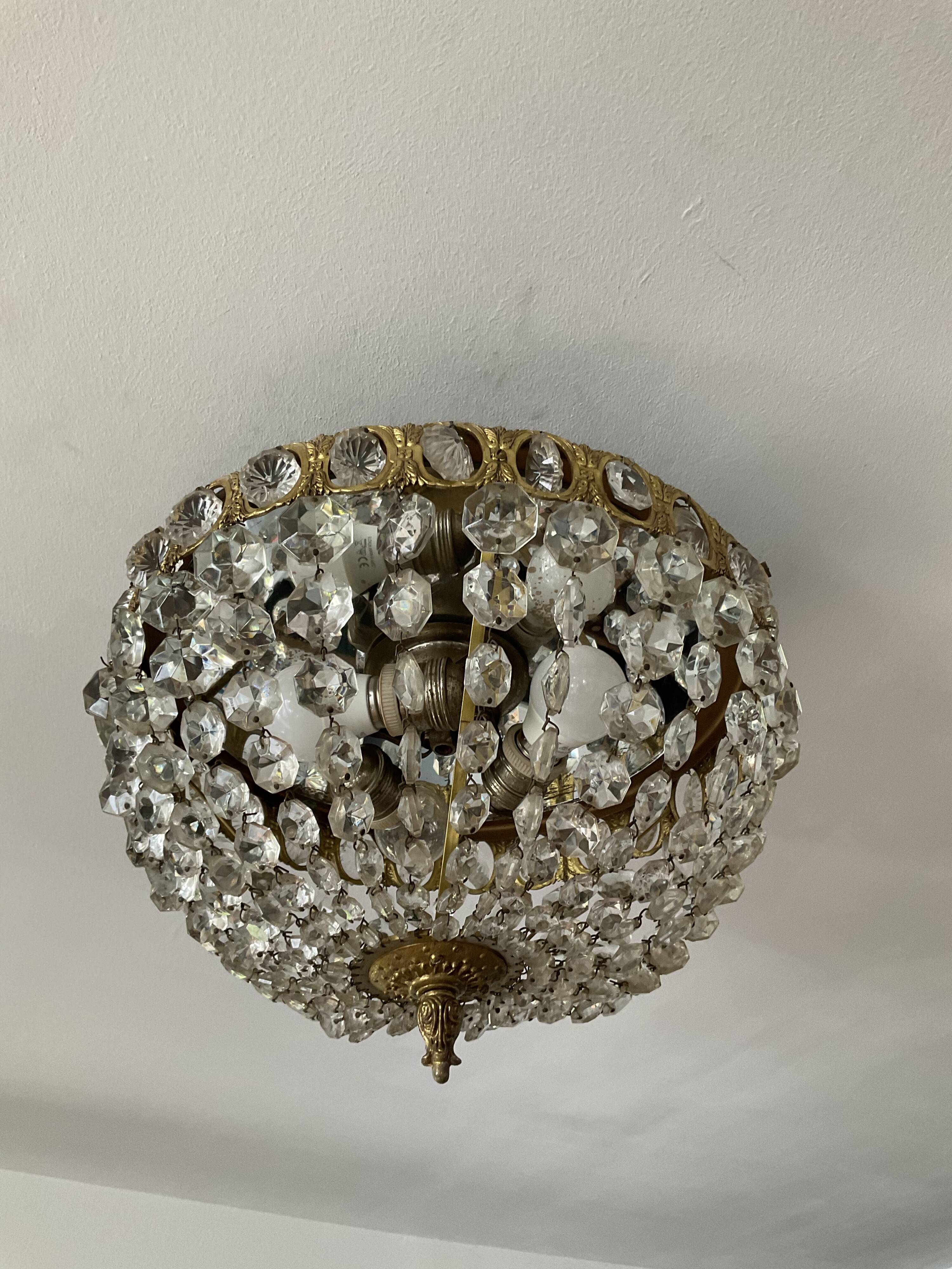 Old ceiling lamp basket in bronze and grapevines