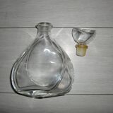 Triangular whiskey bottle