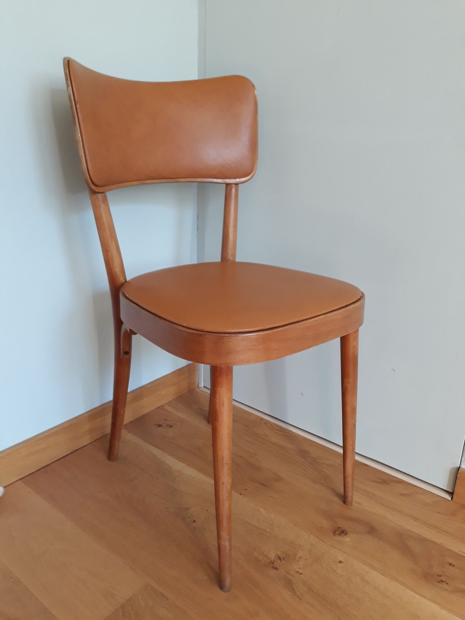 Bistro chair Baumann 1963 curved wood and skaï imitation leather caramel