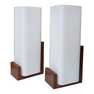 Pair of Louis Kalff opaline and teak wall lamps