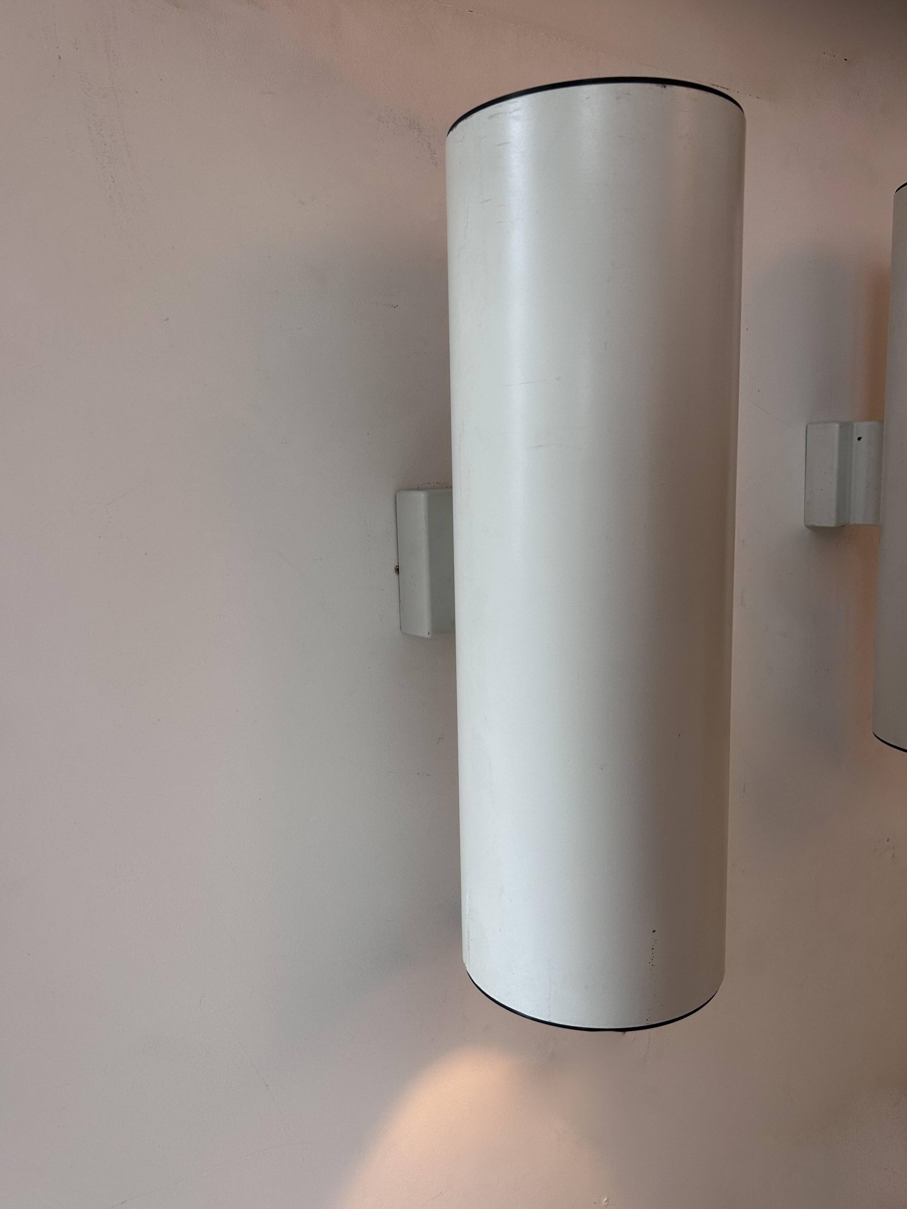 Pair of vintage cylindrical wall lights, matt white metal, Germany Erco 1976