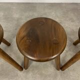 4 wooden tripod stools