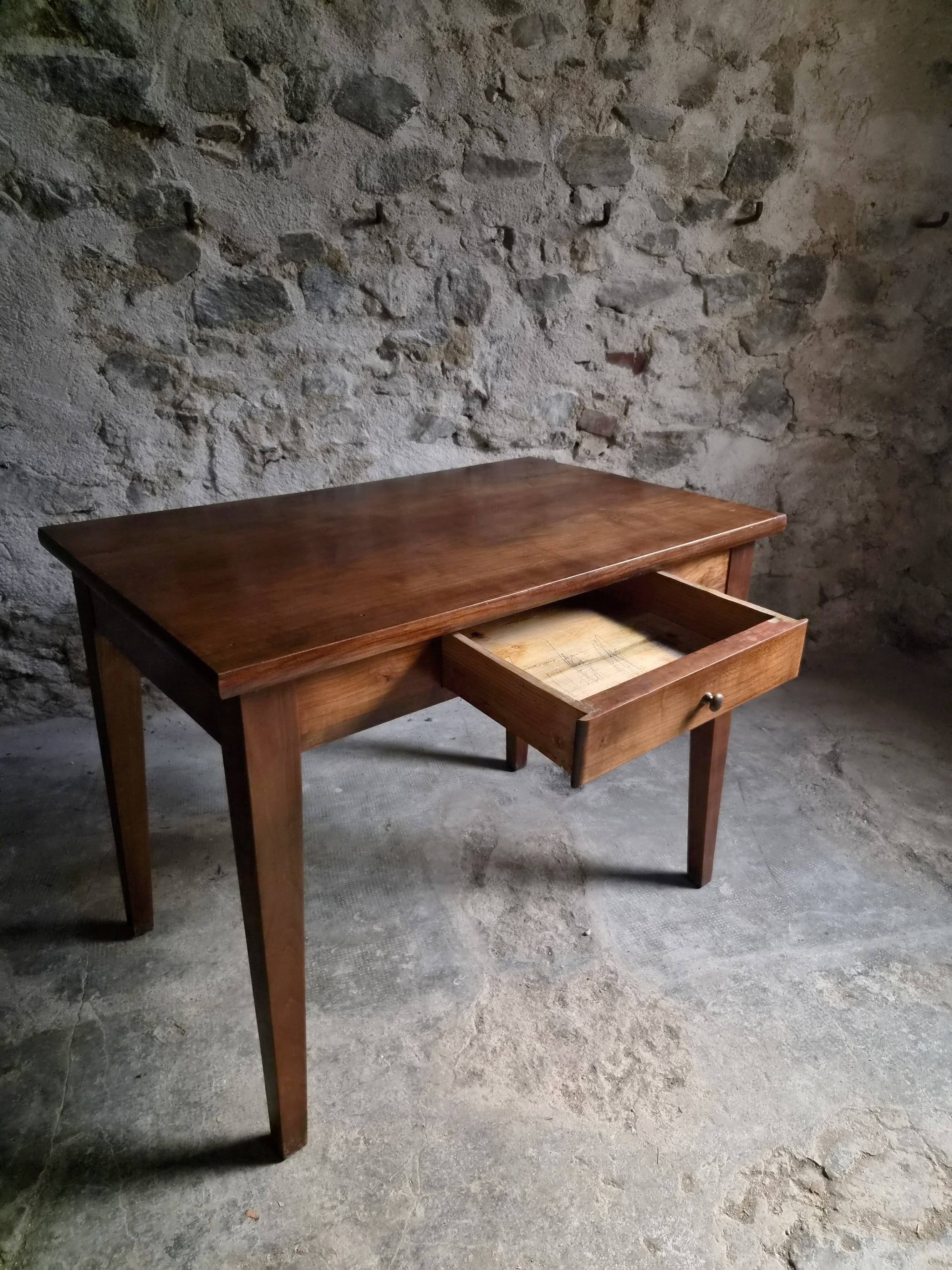 Old French table in cherry wood with bistro chair, circa 1900–1930.