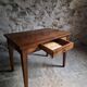 Old French table in cherry wood with bistro chair, circa 1900–1930.