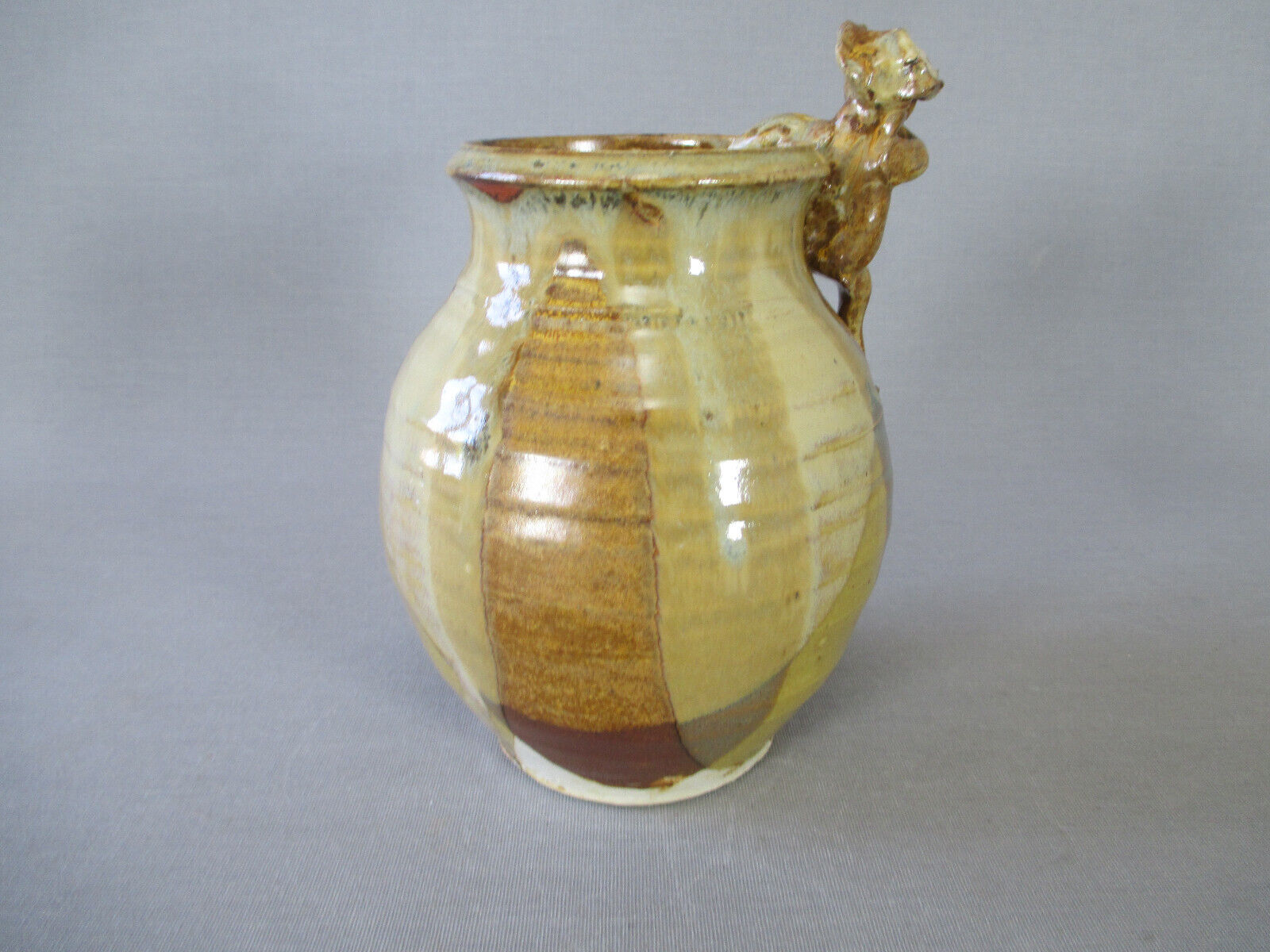 Signed anthropomorphic sandstone vase to be identified