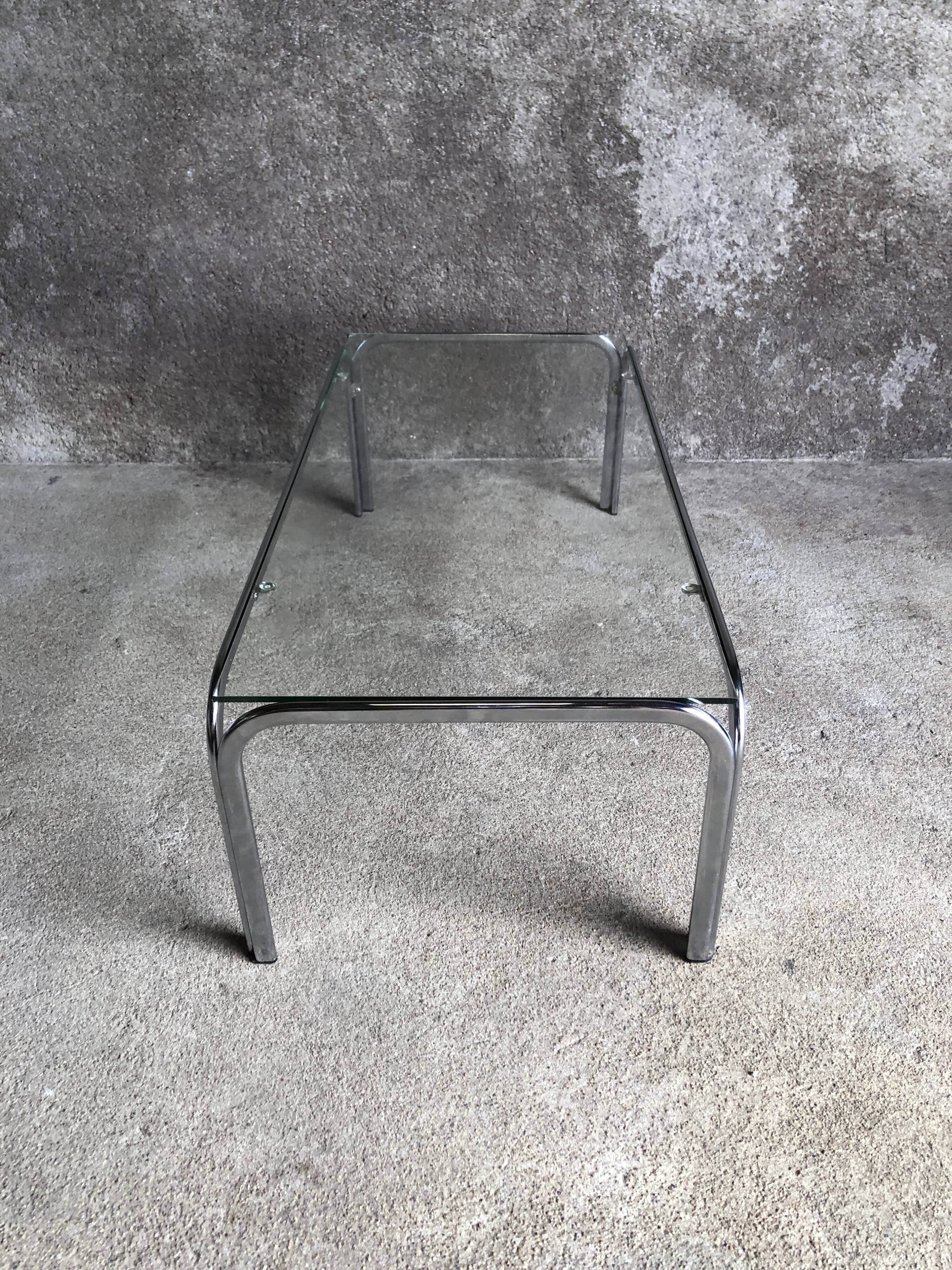 Coffee table with chrome legs and glass top, 1970