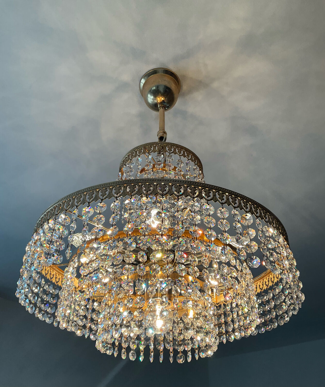 Brass chandelier and crystal tassel waterfall