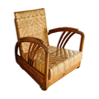 Art Deco armchair in rattan and teak.
