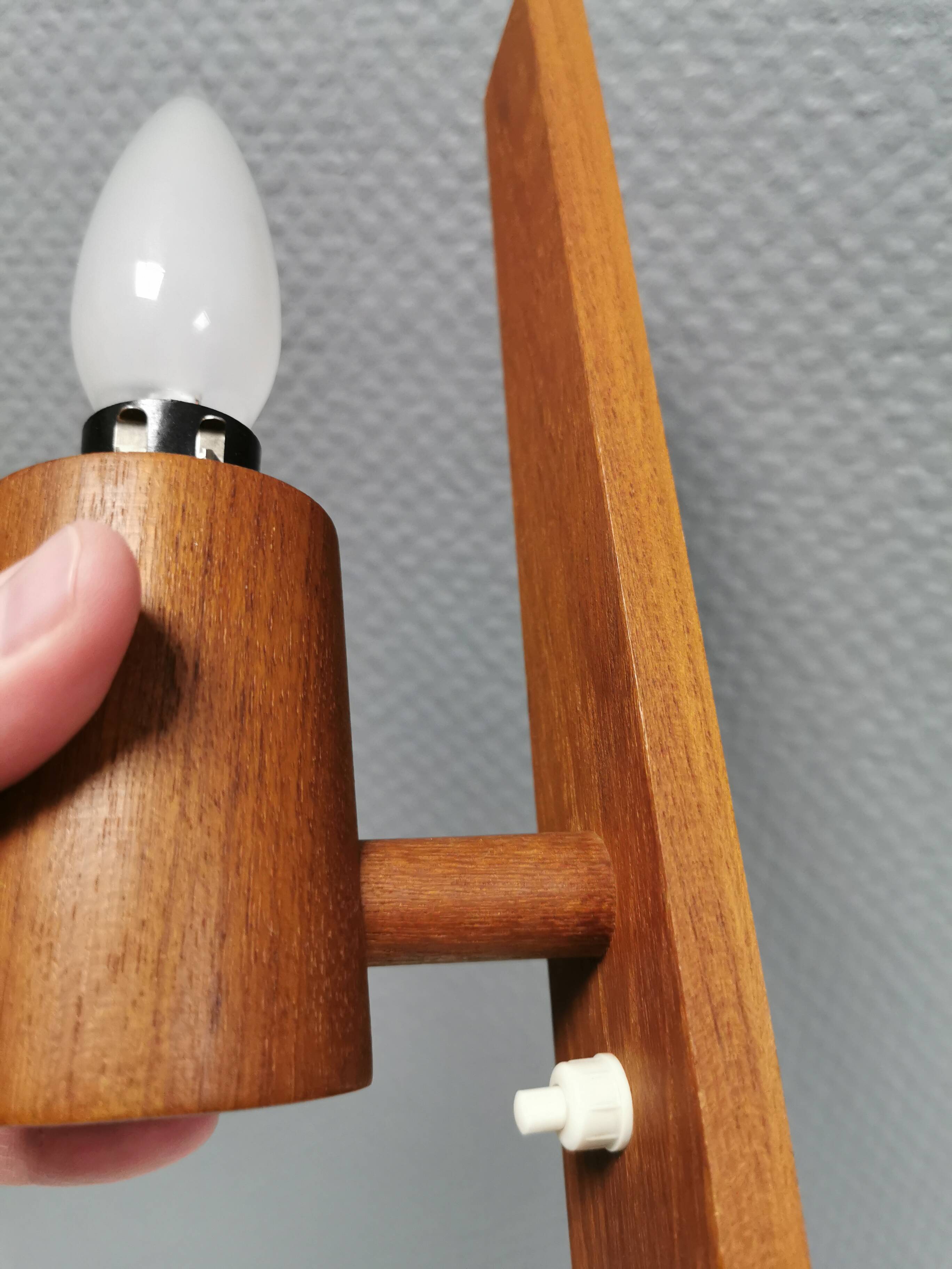 Wall lamp in teak with milky white cone-shaped shade in double glass