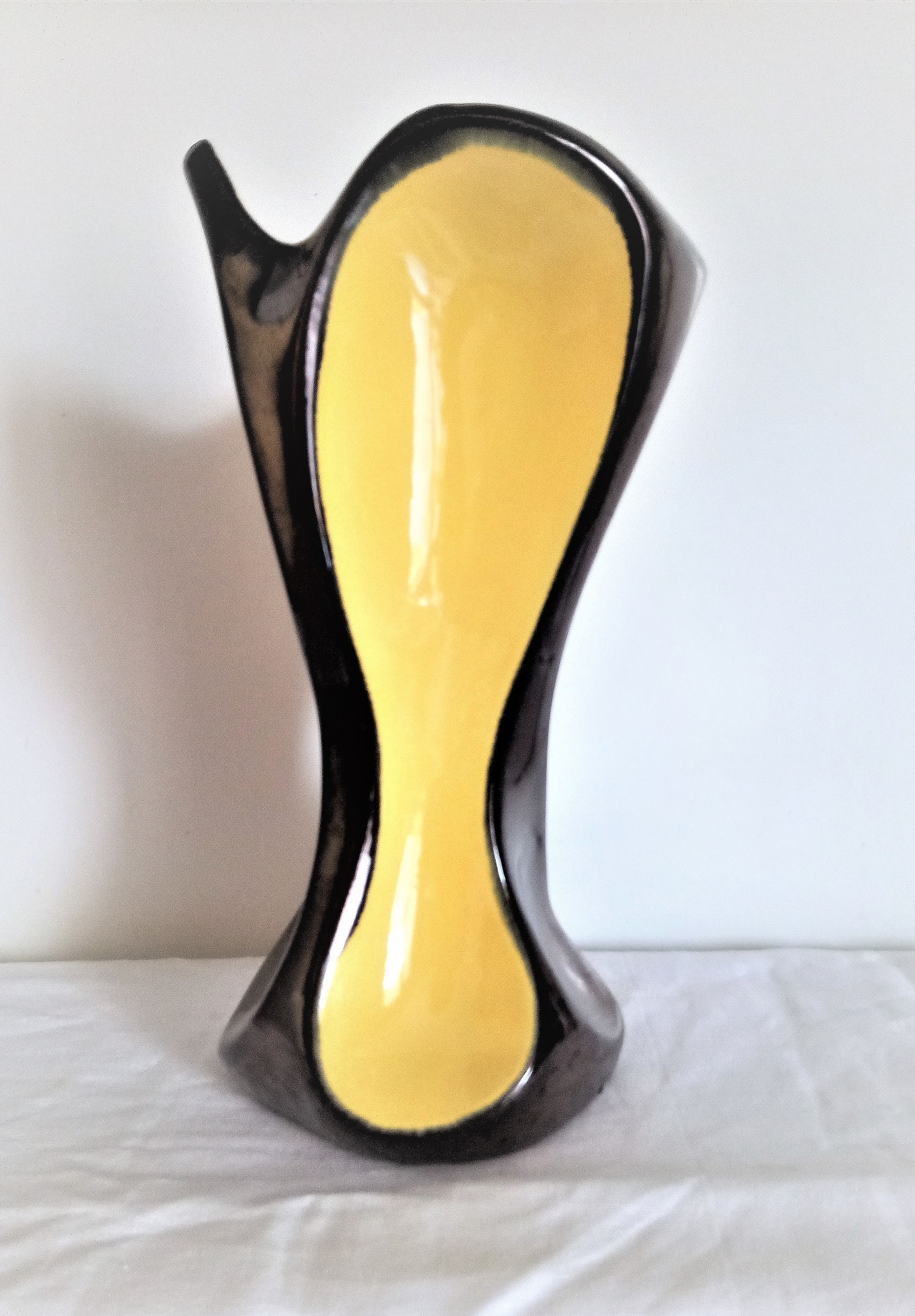 Art Deco vase in two-tone glazed ceramic (black/yellow), signed and numbered