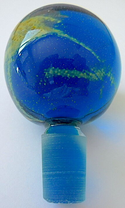 Blown blue glass bottle with inclusions